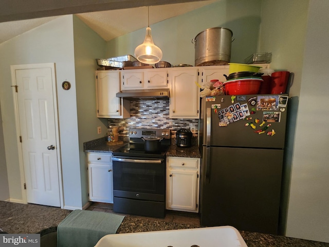 kitchen with under cabinet range hood, freestanding refrigerator, black / electric stove, decorative backsplash, and lofted ceiling