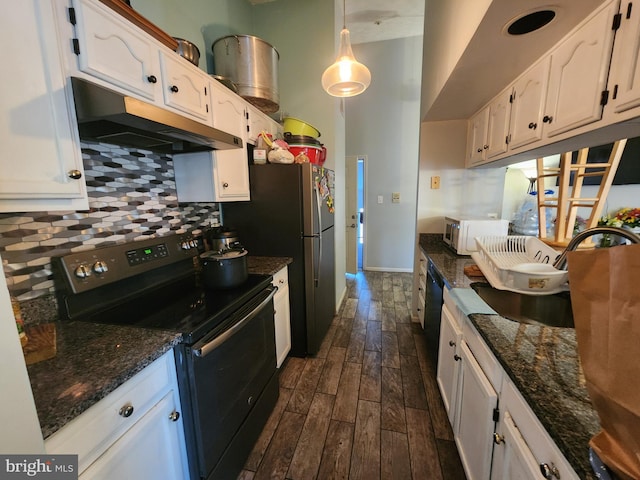 kitchen featuring electric stove, under cabinet range hood, backsplash, white cabinetry, and dark wood-style flooring