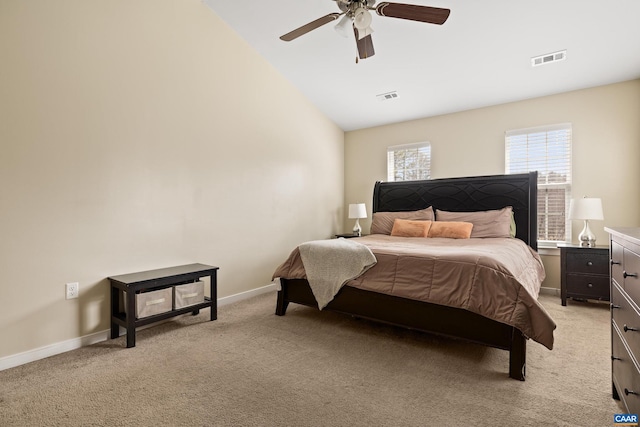 bedroom with visible vents, baseboards, and light colored carpet