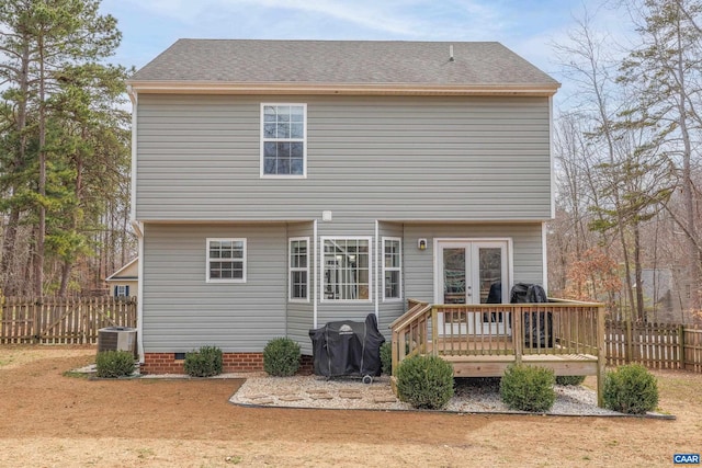 rear view of property with fence, central AC, french doors, crawl space, and a deck