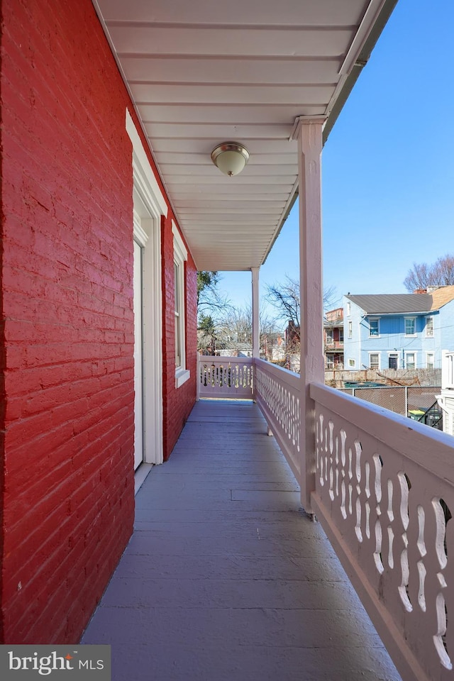 balcony featuring a residential view