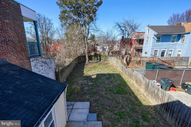 view of yard featuring a fenced backyard