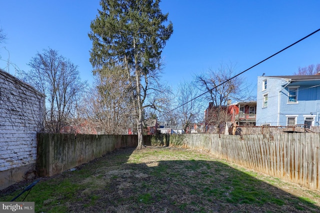 view of yard featuring a fenced backyard