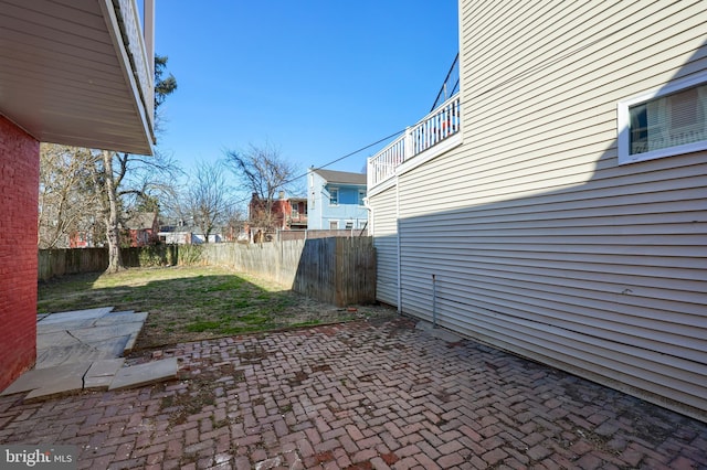 view of yard featuring a fenced backyard and a patio area