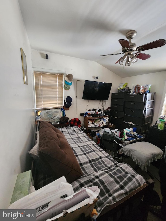 bedroom featuring vaulted ceiling and ceiling fan