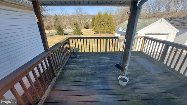 wooden terrace with an outbuilding