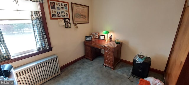 home office featuring baseboards, plenty of natural light, carpet, and radiator heating unit