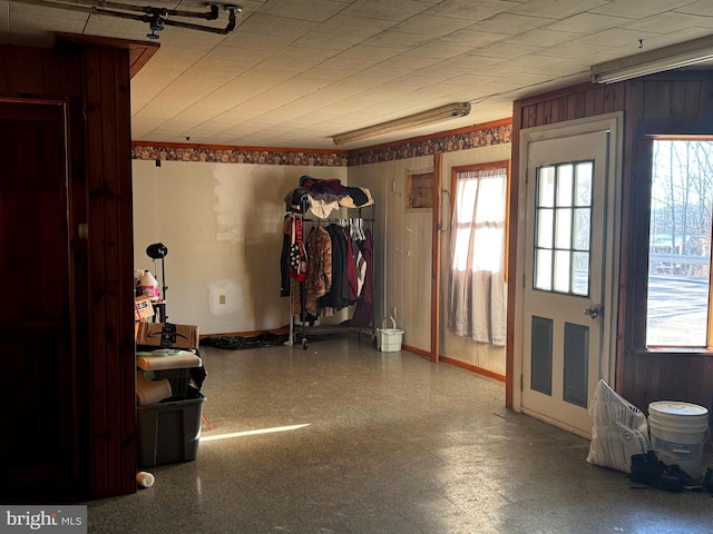 interior space featuring plenty of natural light and baseboards