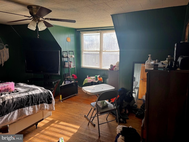 bedroom featuring a ceiling fan and wood finished floors