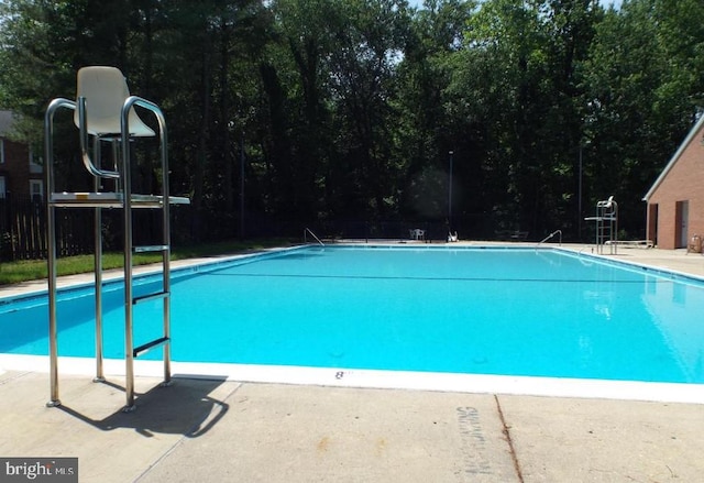 pool featuring a patio area