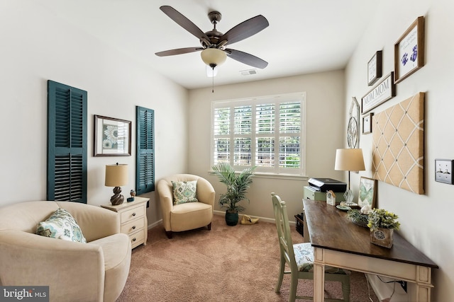 sitting room featuring carpet flooring, a ceiling fan, baseboards, and visible vents