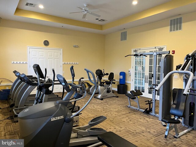 exercise room featuring a ceiling fan and visible vents