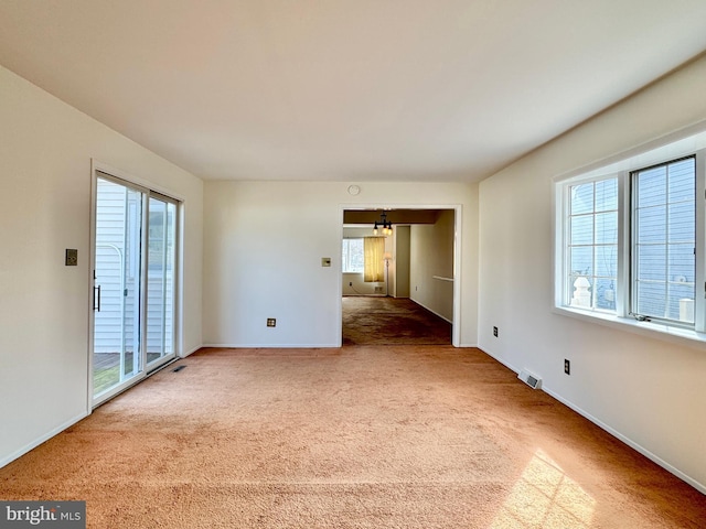 17 Acton, Ewing, NJ 08618 - carpeted spare room with an inviting chandelier, baseboards, and visible vents
