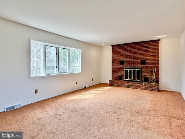 17 Acton, Ewing, NJ 08618 - unfurnished living room with a brick fireplace, carpet, visible vents, and baseboards
