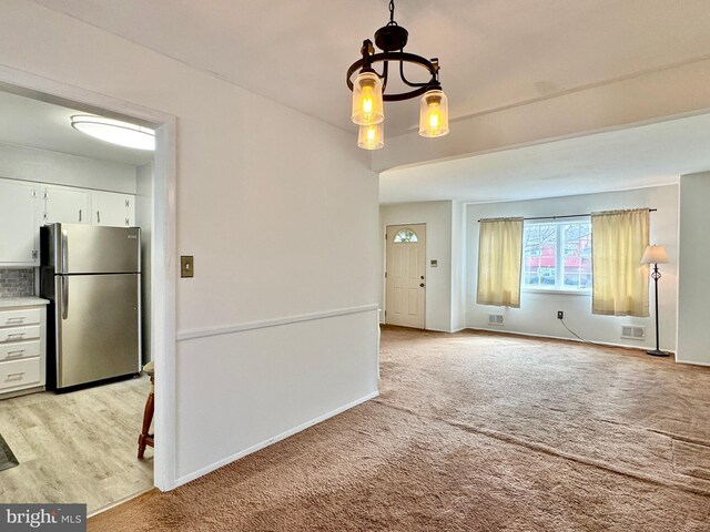 17 Acton, Ewing, NJ 08618 - unfurnished dining area featuring visible vents, baseboards, and light colored carpet
