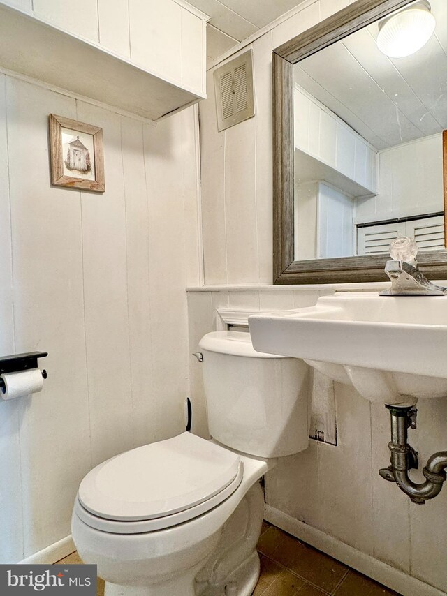 17 Acton, Ewing, NJ 08618 - half bath featuring a decorative wall, toilet, baseboards, and visible vents