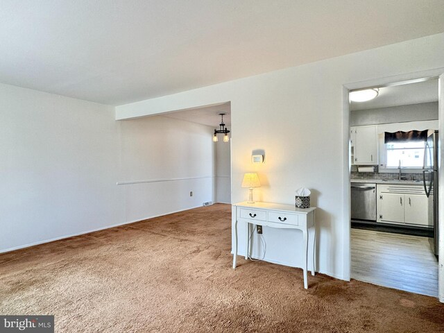 17 Acton, Ewing, NJ 08618 - unfurnished room with a sink and carpet flooring