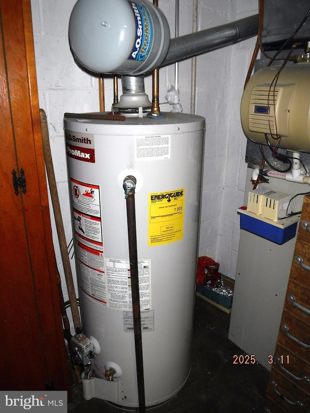 utility room with water heater