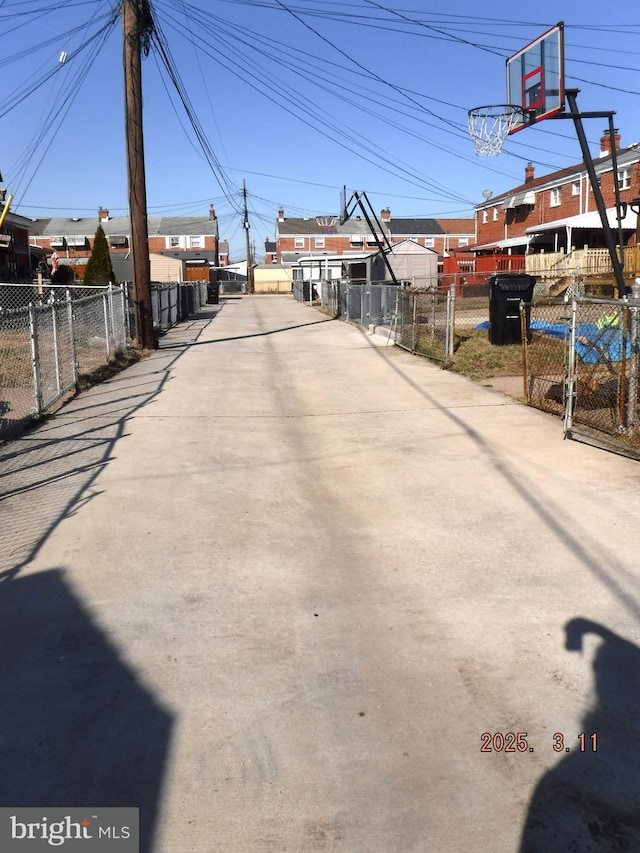 view of street featuring a gate