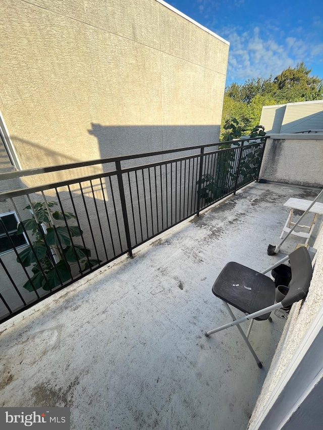 view of patio with a balcony