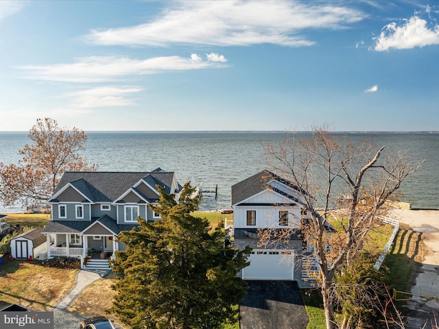 drone / aerial view with a water view