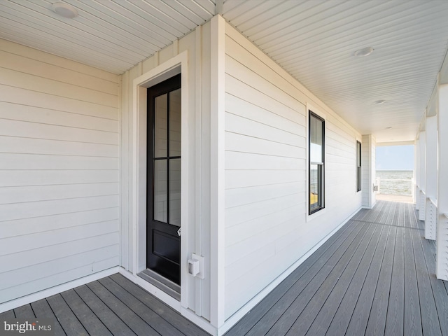 wooden terrace with covered porch