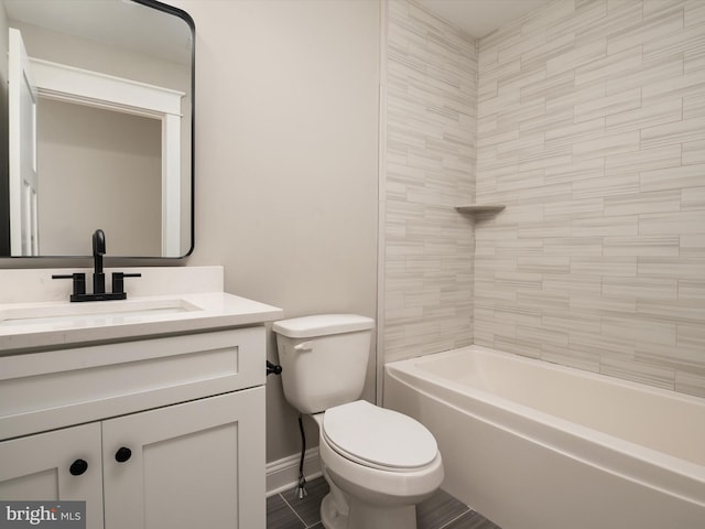 bathroom with toilet, vanity, shower / tub combination, and baseboards