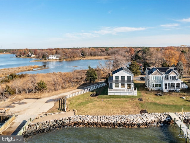 birds eye view of property featuring a water view