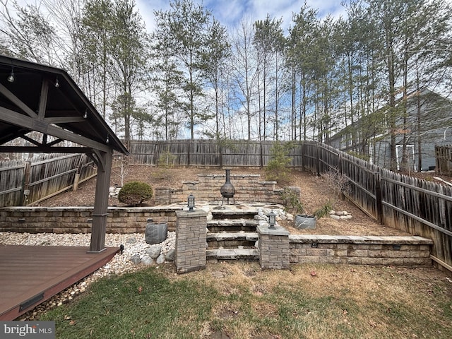 view of yard with a fenced backyard