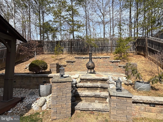 view of yard with a fenced backyard