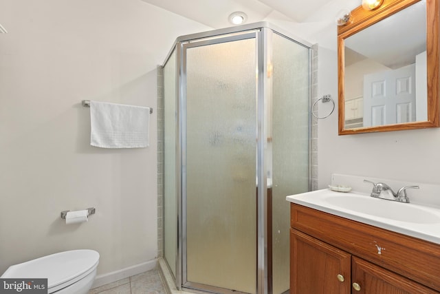 full bathroom with tile patterned flooring, baseboards, toilet, a stall shower, and vanity