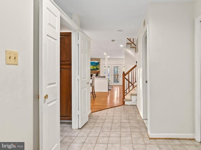 hallway featuring light tile patterned floors, stairway, visible vents, and recessed lighting