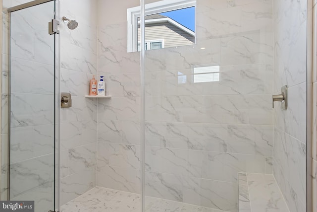 full bathroom with a shower stall