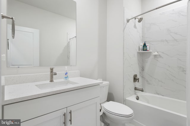 full bathroom featuring vanity, shower / tub combination, and toilet