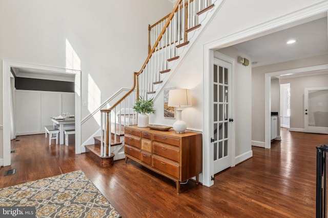 interior space featuring visible vents, recessed lighting, wood finished floors, and baseboards