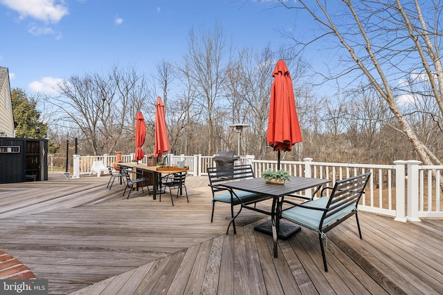 deck with outdoor dining space