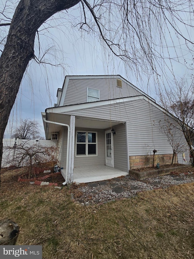 back of house featuring a patio