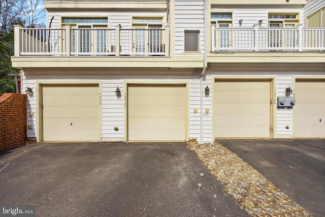 garage featuring driveway