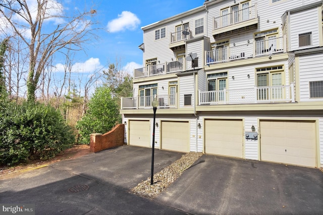 view of front of property featuring driveway and an attached garage