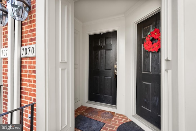 entrance to property with brick siding