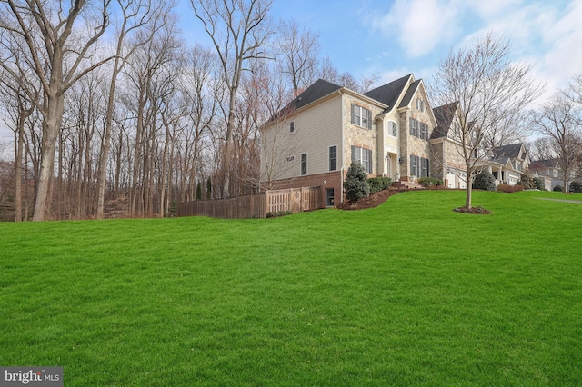 view of property exterior featuring stone siding and a lawn