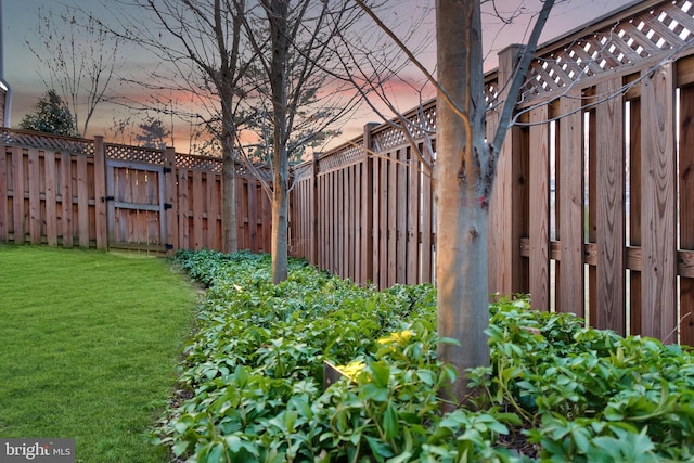 view of yard with fence