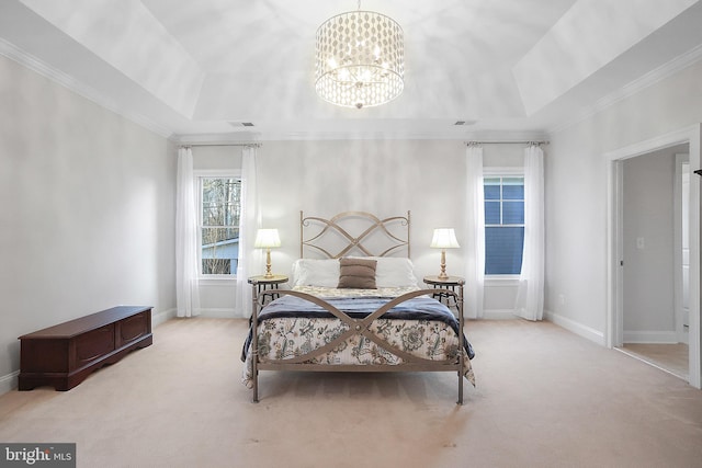 carpeted bedroom with a notable chandelier, crown molding, a raised ceiling, and baseboards