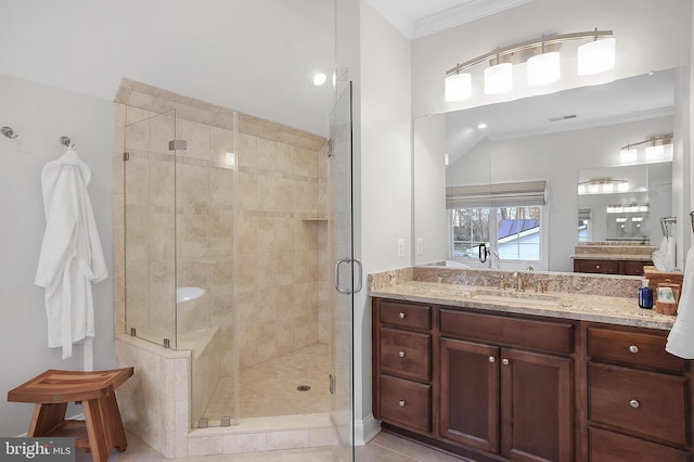 bathroom featuring visible vents, a shower stall, crown molding, tile patterned floors, and vanity