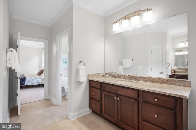 bathroom with tile patterned floors, toilet, ensuite bathroom, and ornamental molding