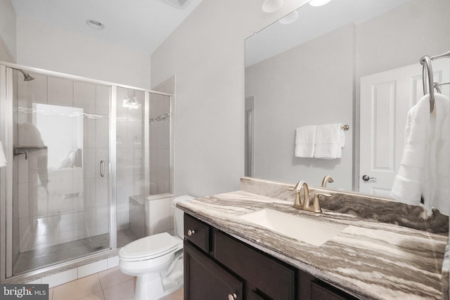 full bath with tile patterned flooring, a shower stall, toilet, and vanity