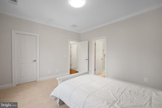 bedroom with visible vents, baseboards, light colored carpet, and ornamental molding