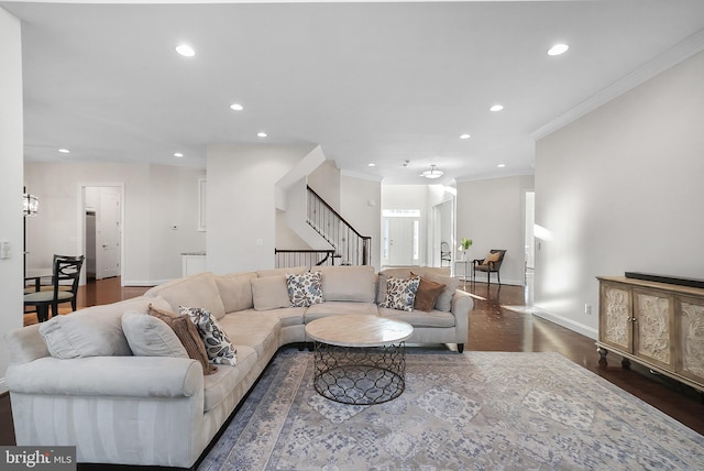 living area featuring stairway, recessed lighting, baseboards, and wood finished floors