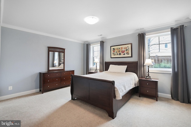 bedroom with light carpet, multiple windows, baseboards, and ornamental molding