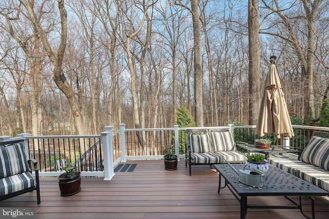 wooden deck with an outdoor hangout area